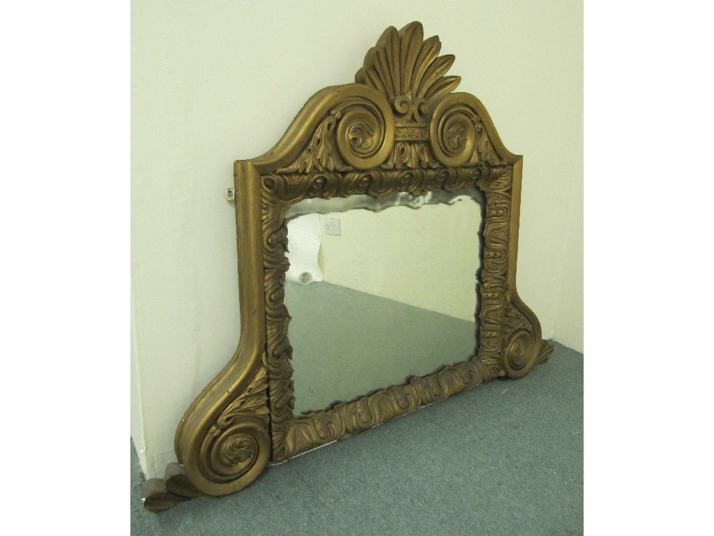 Appraisal: A Victorian gilt overmantle mirror with a crested pediment to