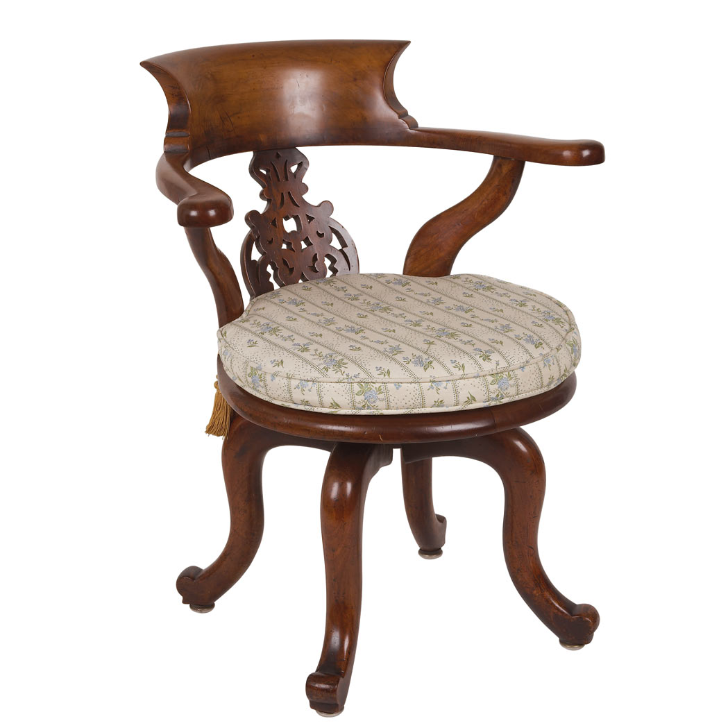 Appraisal: Provincial George II Style Mahogany Rotating Desk Chair The curved