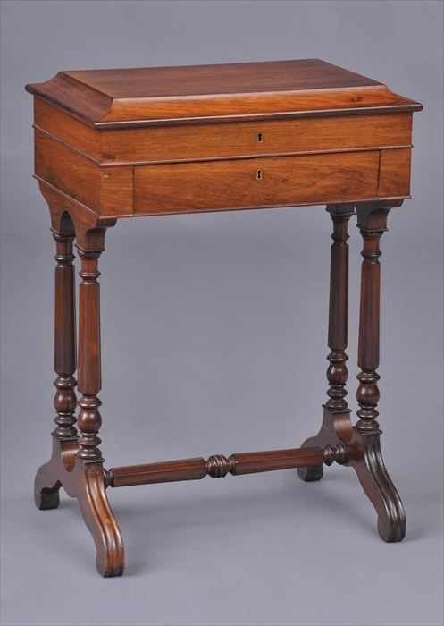 Appraisal: REGENCY ROSEWOOD DRESSING TABLE The flattened dome hinged lid opening