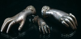 Appraisal: Three cast silver plated miniature models of hands of various