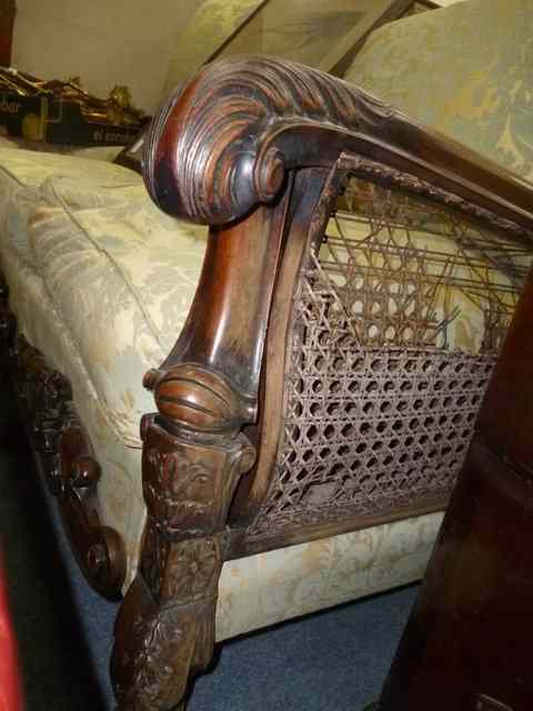 Appraisal: AN EARLY TH CENTURY MAHOGANY FRAMED BERGERE THREE SEATER SOFA