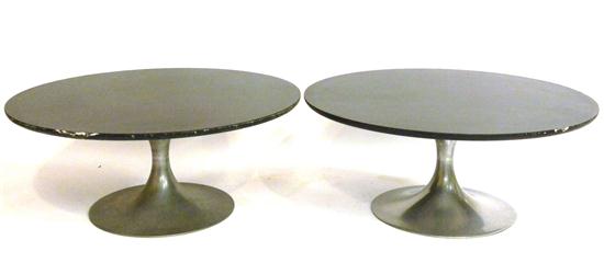 Appraisal: Two Eero Saarinen style design round coffee tables black laminate