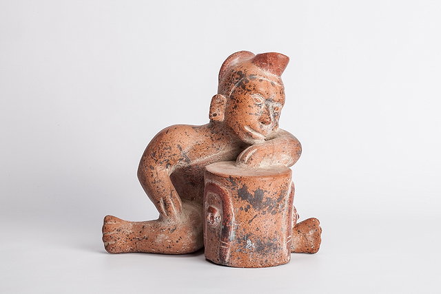 Appraisal: A SOUTH AMERICAN MAYAN STYLE TERRACOTTA SEATED FIGURE of a