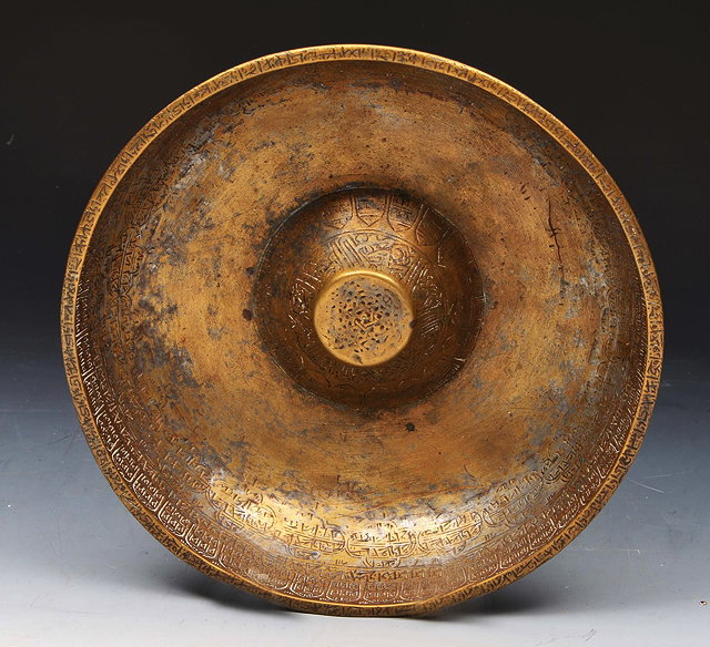 Appraisal: A MIDDLE EASTERN ENGRAVED BRONZE DIVINATION 'MAGIC' BOWL with Islamic