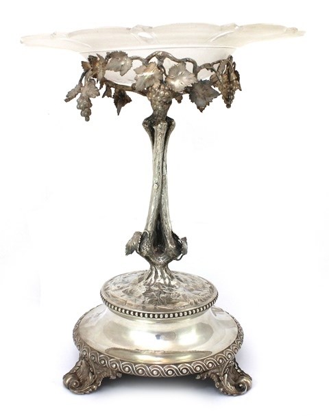 Appraisal: A Victorian silver table centrepiece stand of rustic form decorated