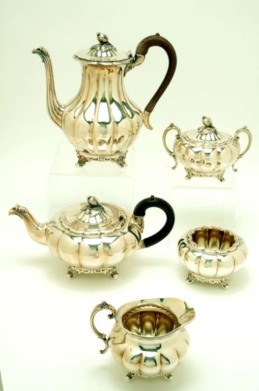 Appraisal: Five piece melon pattern silverplated tea service including coffee pot