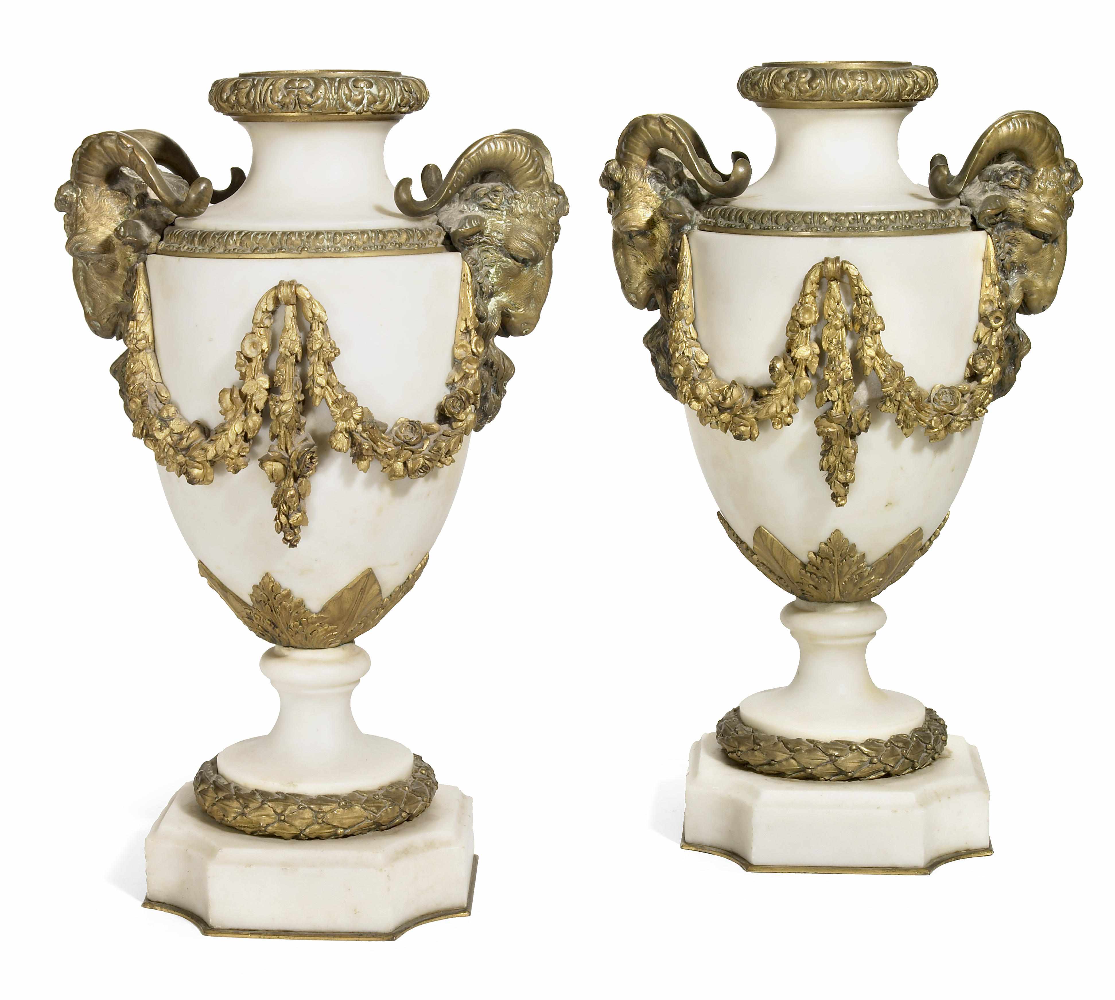 Appraisal: A pair of Louis XVI style gilt bronze mounted white