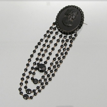 Appraisal: A Victorian Mourning Brooch Cameo With Beads Constructed with a