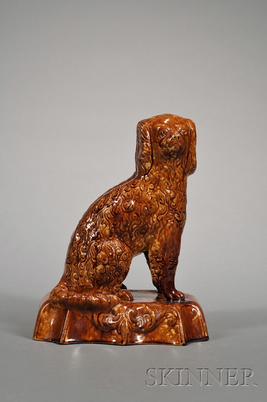 Appraisal: Rockingham Glazed Yellowware Pottery Spaniel attributed to Isaac Knowles East