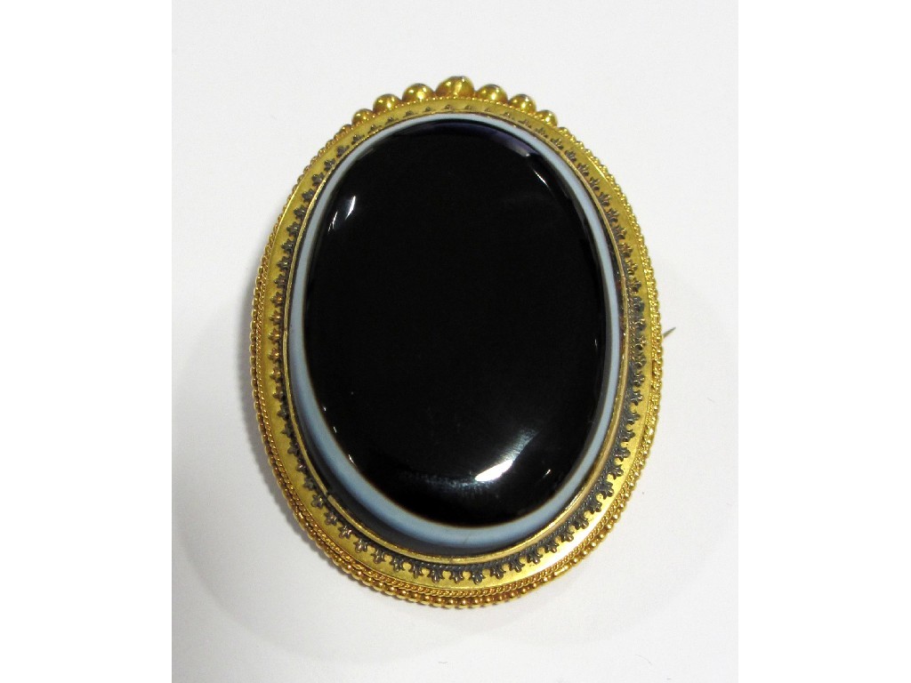 Appraisal: A Victorian banded agate remembrance brooch with oval agate mounted