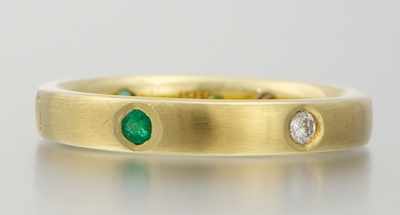 Appraisal: A Ladies' k Gold Emerald and Diamond Band k yellow