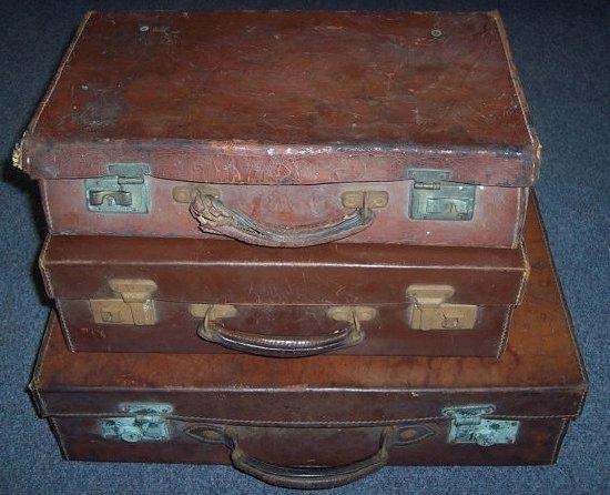 Appraisal: Three leather suitcases