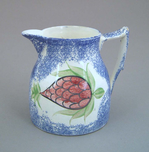 Appraisal: Blue spatter creamer with pineapple decoration h