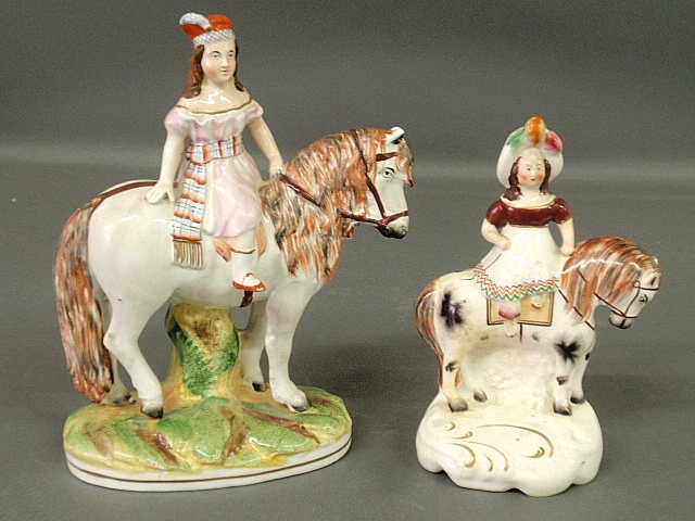 Appraisal: - Two Staffordshire equine figures- a Scotswoman x and a