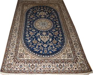 Appraisal: PERSIAN NAIN WOOL AND SILK ORIENTAL CARPET W ' L