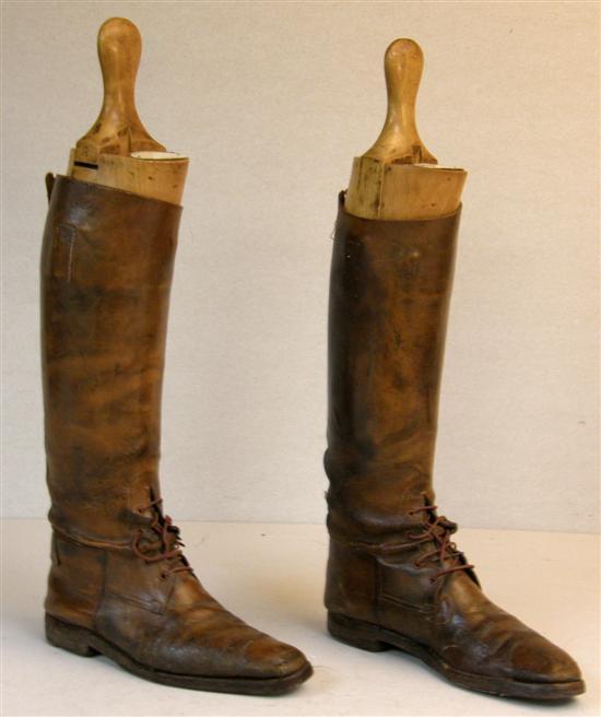 Appraisal: Pair of leather riding boots with wooden stretchers and makers