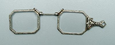 Appraisal: White gold lorgnette embossed scroll and openwork decoration stamped D