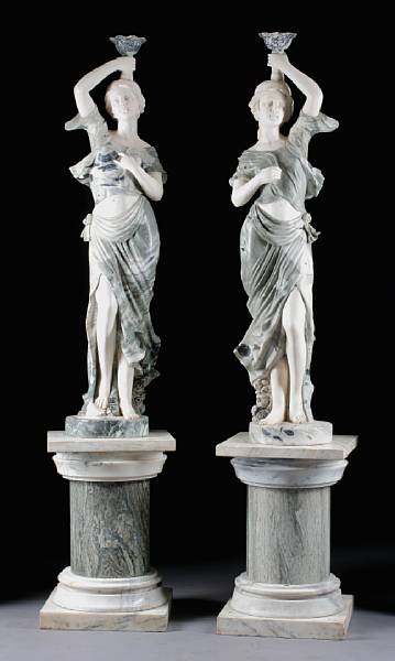 Appraisal: A pair of carved marble figures Each in the form