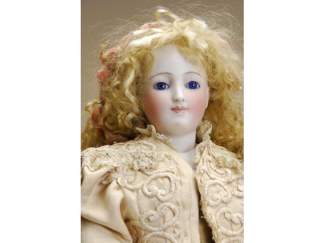 Appraisal: Portrait Face French Fashion Doll with Twill Body France ca