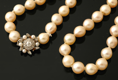 Appraisal: STRAND OF CREAM BAROQUE CULTURED PEARLS TO AN CT GOLD