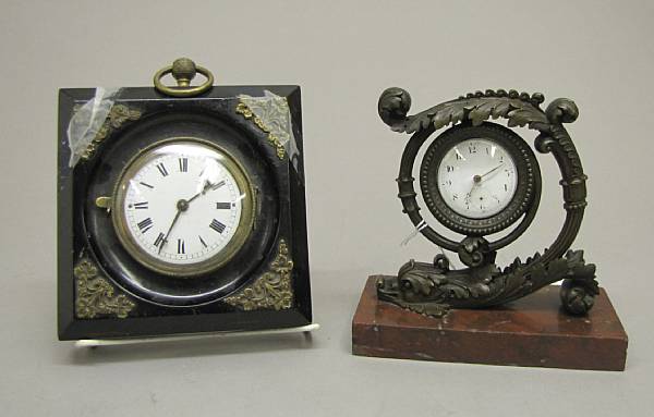 Appraisal: A Neoclassical style bronze pocket watch holder and Vienna ebonized