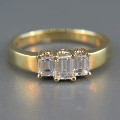 Appraisal: Diamond Ring emerald cut diamonds totaling carat in k yellow