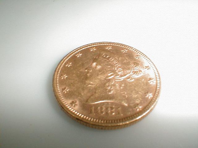 Appraisal: An US gold dollar coin