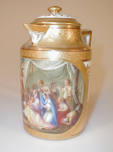 Appraisal: A Vienna chocolate pot and cover painted with Alexander The