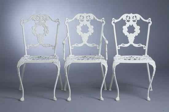 Appraisal: SET OF SIX WHITE-PAINTED CAST IRON CHAIRS Including one open