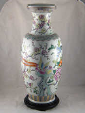 Appraisal: A tall Chinese ceramic baluster vase decorated with prunus birds