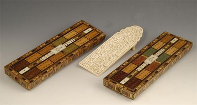 Appraisal: A late th century Chinese carved ivory cribbage board decorated