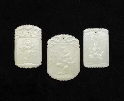 Appraisal: Three Chinese Jade Plaques Each with a tiny hole at