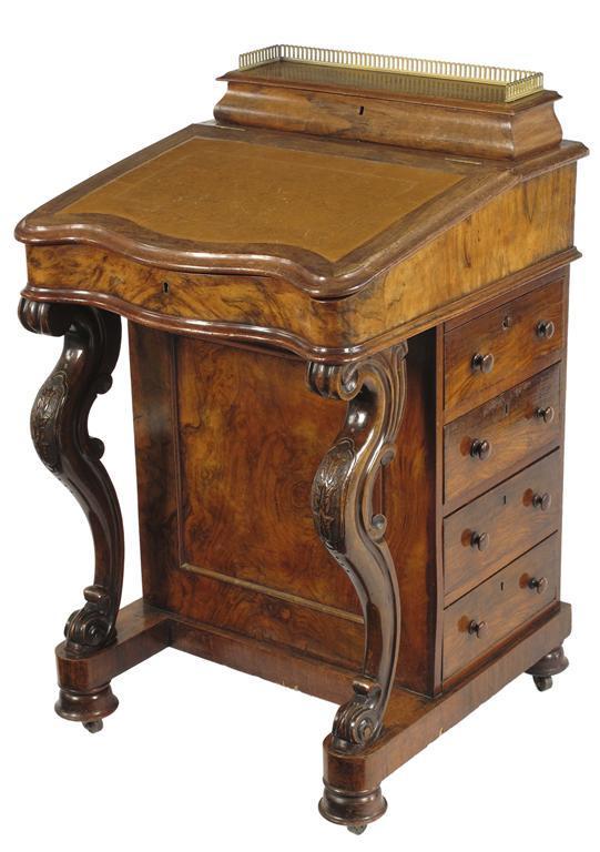 Appraisal: A Victorian walnut Davenport