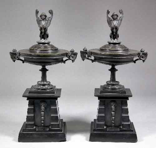 Appraisal: A pair of th Century black slate and patinated bronze