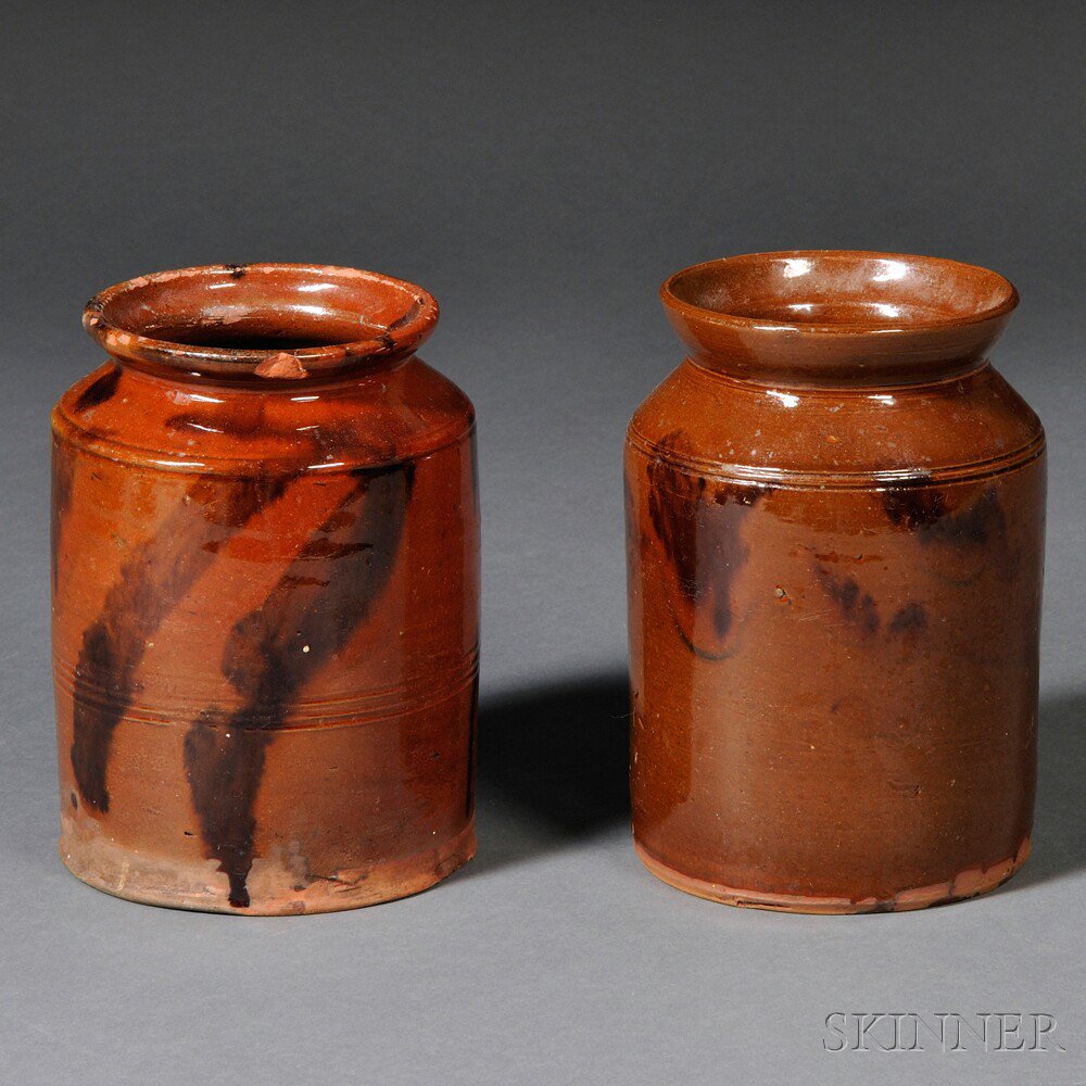 Appraisal: Two Redware Jars America early th century straight-sided jars decorated