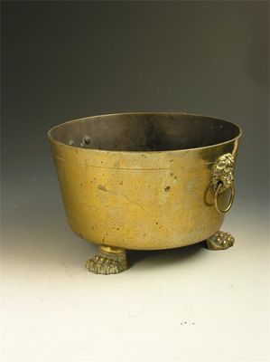 Appraisal: A late th century brass pot with paw feet and