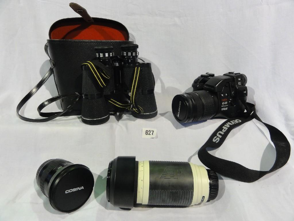 Appraisal: An Olympus E megapixel camera complete with some accessories and