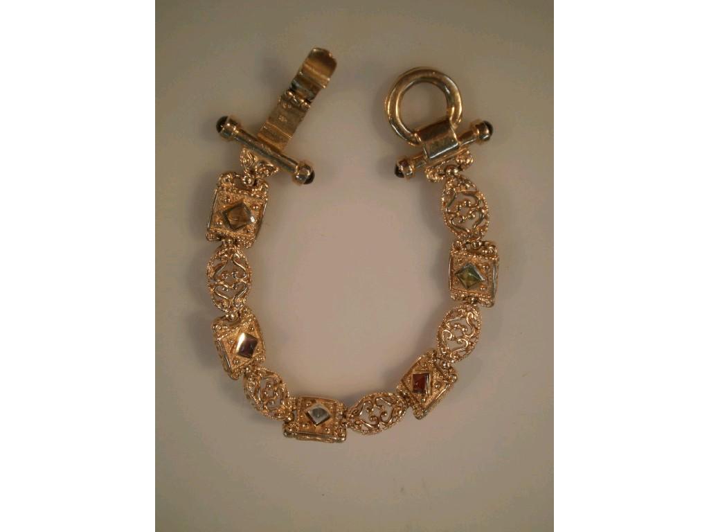 Appraisal: A fancy link bracelet set with small semi previous accents