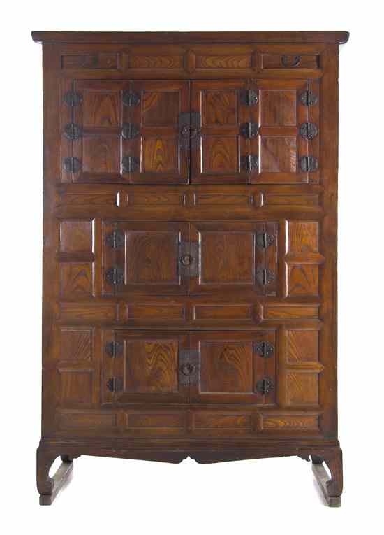 Appraisal: An Asian Hardwood Tansu of rectangular form set with a