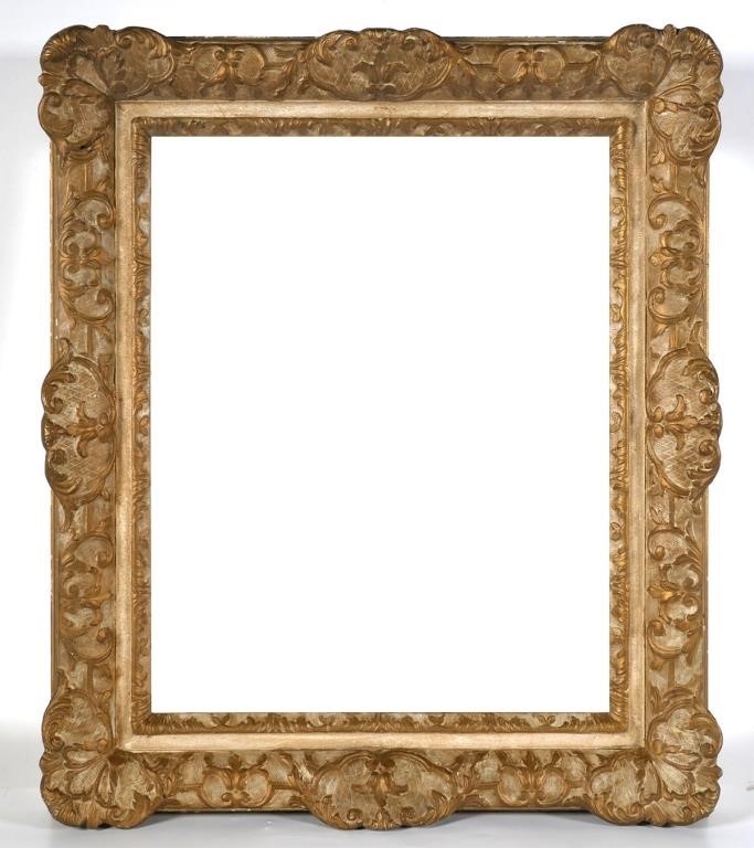 Appraisal: Empty ornate gilt picture frame with distinctive splines on back