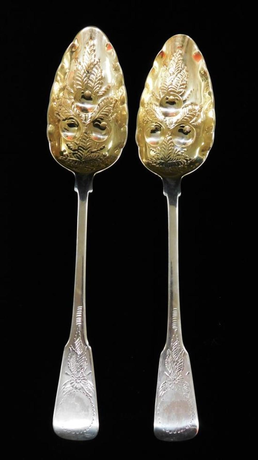 Appraisal: STERLING George III sterling pair berry spoons London gilt wash