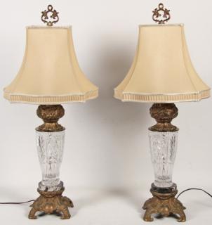 Appraisal: PAIR OF CRYSTAL ON BLACK MARBLE AND PATINATED METAL LAMPS