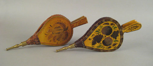 Appraisal: Two painted bellows th c retaining their original yellow surface