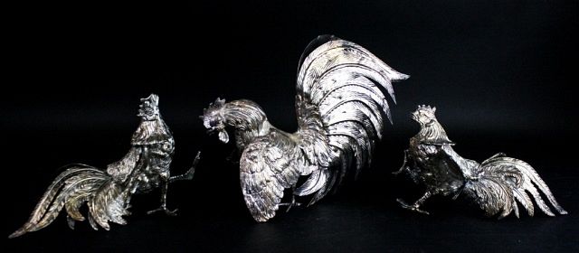 Appraisal: Silverplate Roosters Pair of silverplate fighting roosters each approximately L