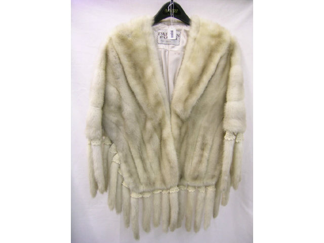 Appraisal: Ivory Mink cape with gathered edge and mink tail trim