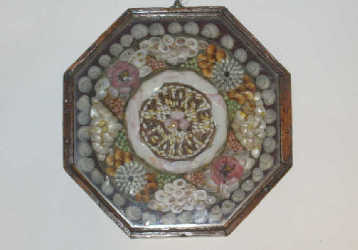 Appraisal: OCTAGONAL SAILORS SHELLWORK VALENTINE With a finely detailed concentric design