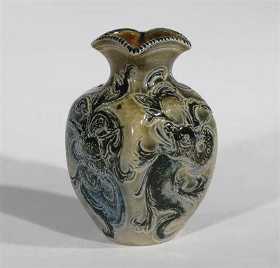 Appraisal: A Martin Brothers stoneware vase swollen square section modelled in