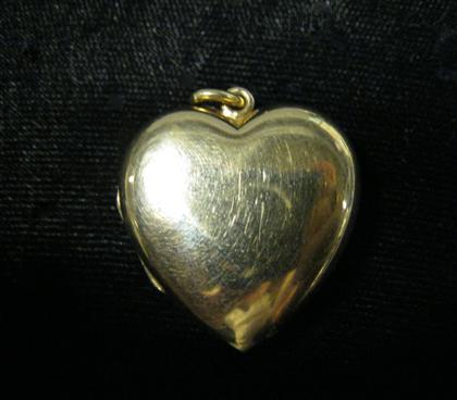 Appraisal: karat yellow gold locket pendant Tiffany Co Heart shaped