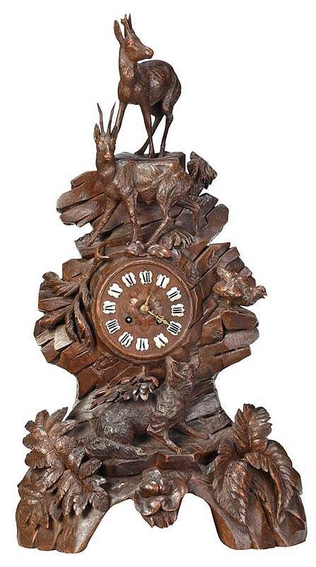 Appraisal: Large Black Forest Carved Figural Mantel Clock Continental late th