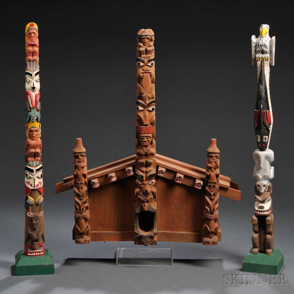 Appraisal: Three Polychrome Carved Wood Folk Art Carvings two totem poles